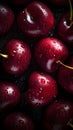 Cherries covered in water droplets against a dark background look very appetizing and tempting. Royalty Free Stock Photo