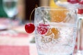 Cherries in a glass with mineral sparkling water Royalty Free Stock Photo