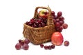 Cherries, grapes and apples in a basket on a white background Royalty Free Stock Photo