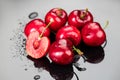 Cherries on gray background. Fresh ripe Cherry berries close-up. Organic red cherries with water drops Royalty Free Stock Photo