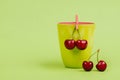 Cherries on green background Royalty Free Stock Photo