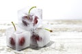 Cherries inside ice cubes