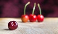 Cherries on a wooden table.