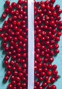Cherry background with white ribbon. Fresh organic berries. Pile of ripe cherries Royalty Free Stock Photo