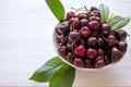 Cherry berries in a bowl on a white background. Fresh cherries. The concept of a healthy diet and support for local producers. Clo Royalty Free Stock Photo