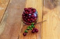 cherry berries in a glass vase