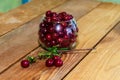 cherry berries in a glass vase