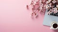 Cherry blossom flowers, coffee cup on laptop overhead ai generated banner copy space