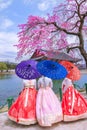 Cherry Blossom with Korean national dress at Gyeongbokgung Palace Seoul, South Korea Royalty Free Stock Photo