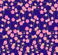 Cherry blossoms with the branches pattern on a violet background