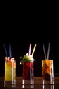 Cherry bomb, screwdriver and cuba libre cocktails in a tall glasses Royalty Free Stock Photo