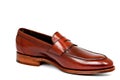 Cherry calf penny loafer shoe toe to right Royalty Free Stock Photo