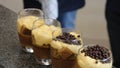 Cherry cheesecake on the table. Served assorted of chocolate and fruit mini cakes for holiday,selective focus. Fruit