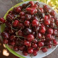 Cherry cherries ripe bright in drops of dew abundance