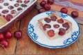 Cherry Clafoutis with powdered sugar Royalty Free Stock Photo