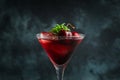 Cherry cocktail in martini glass with berries and mint leaves Royalty Free Stock Photo