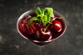 Cherry cocktail in martini glass with berries and mint leaves Royalty Free Stock Photo