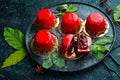 Cherry cream-mousse dessert with cherries and mint on a black stone plate. Top view. Rustic style Royalty Free Stock Photo