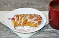 Cherry Danish Pastry and Coffee on Rustic Wood Table Royalty Free Stock Photo