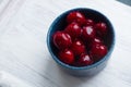 Cherry in a dark vase Royalty Free Stock Photo