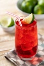 Cherry drink with lime wedges Royalty Free Stock Photo