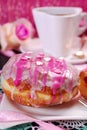 Cherry filled donuts with icing and coffee for valentines Royalty Free Stock Photo