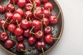 Cherry freshness Plate of sweet cherries with water droplets, tempting