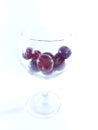 Cherry fruit in a transparent wineglass. Cherry for a snack. Photo 