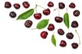 cherry with green leaf isolated on white background