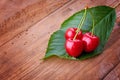 Cherry - Heap of fresh berries on wood.