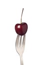 Cherry held by a fork