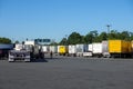 Cherry Hill, New Jersey - August 18, 2022: Row of trucks parked at a truck stop on the thruway rest stop Royalty Free Stock Photo