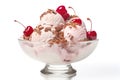 Cherry ice cream sundae with fresh cherries on top and chocolate sprinkles, in a glass bowl isolated on white background Royalty Free Stock Photo