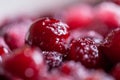 Cherry jam. Close up of simmering homemade cherry jam. Cherry and sugar crystal. Stewed cornel dogwood or cornelian cherry backg