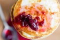 Cherry jam on pancakes top view Royalty Free Stock Photo