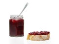 Cherry jam on slice of bread Royalty Free Stock Photo