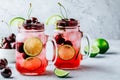 Cherry Limeade or Lemonade in glass mason jar. Ice cold summer drink. Royalty Free Stock Photo