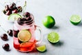 Cherry Limeade or Lemonade in glass mason jar. Ice cold summer drink. Royalty Free Stock Photo