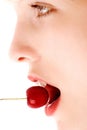 Cherry in the mouth Royalty Free Stock Photo