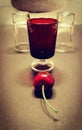 Three glasses and one cherry. Royalty Free Stock Photo
