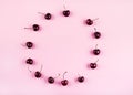 Cherry pattern frame on pink background