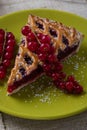 Cherry pie on green plate Royalty Free Stock Photo