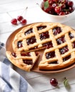 Cherry pie with lattice crust on white wooden background Royalty Free Stock Photo