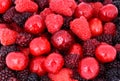 Cherry, raspberry, blackberry on full background Royalty Free Stock Photo