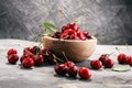 Cherry. Red fresh Cherries in bowl and a bunch of cherries on th Royalty Free Stock Photo