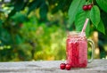 Cherry smoothie in mason jar