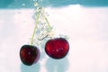 Cherry splashing Royalty Free Stock Photo