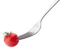 Cherry tomato on fork isolated on white background cutout. Healthy eating concept. Royalty Free Stock Photo