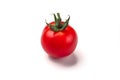 Single Cherry tomato isolated over white background Royalty Free Stock Photo