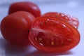 Cherry tomato in a section Royalty Free Stock Photo